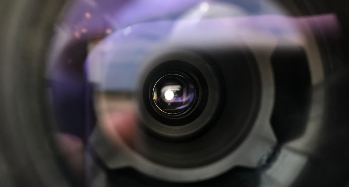a close up of a camera lens with a blurry background